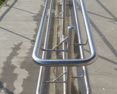 Image showing a stainless steel handrail inside the grounds of a school, constructed by Stainless Works